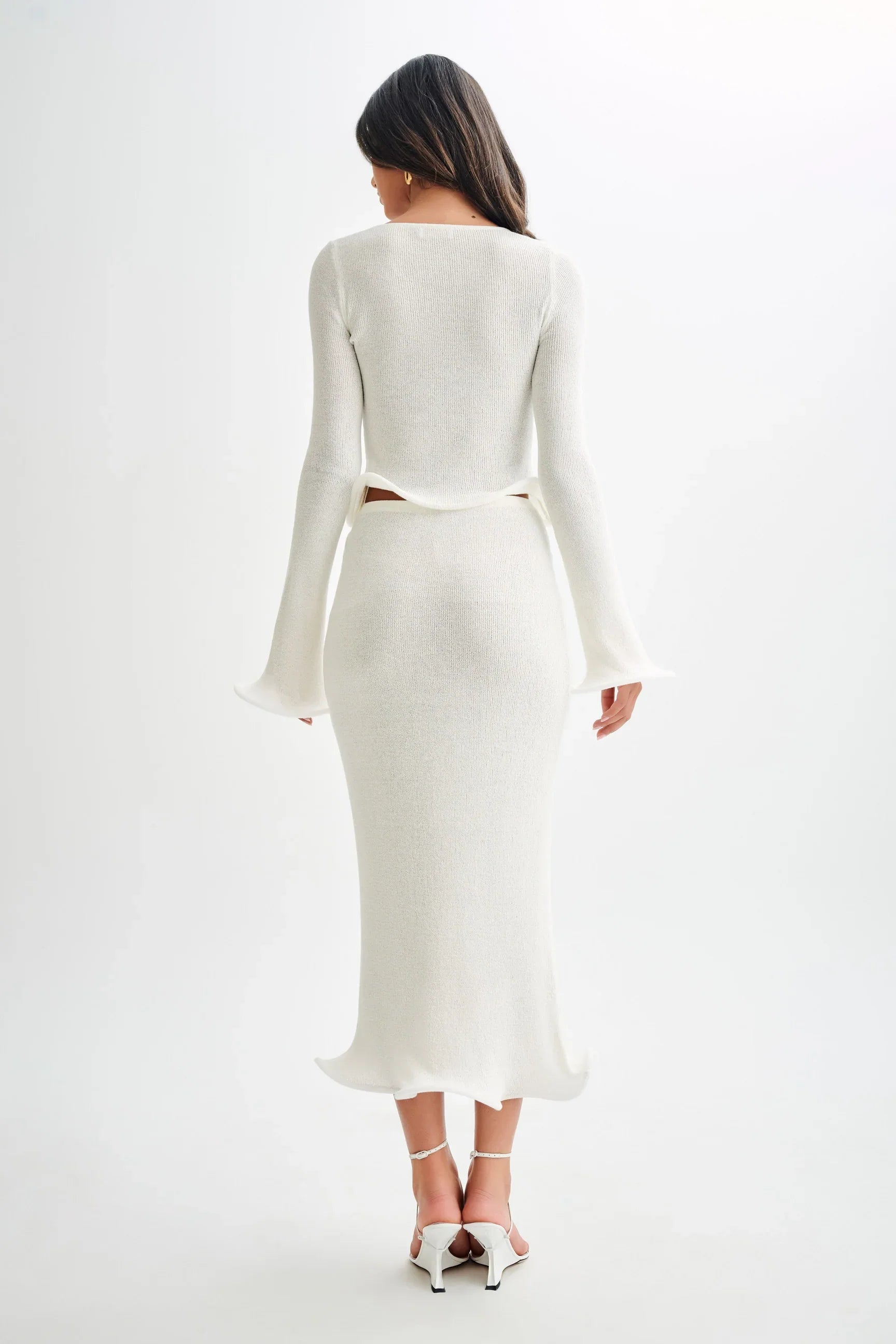 Stylish knit top and skirt set for fashion-conscious women offering elegance and comfort
